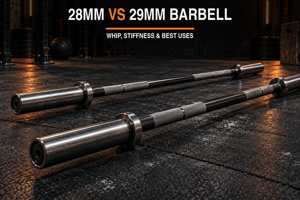 28mm vs 29mm barbell comparison in a dark garage gym