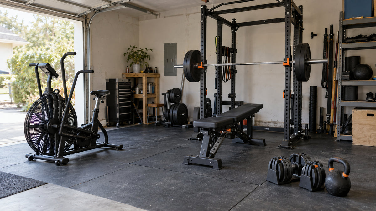 Complete strength and conditioning setup in a realistic light-colored garage gym